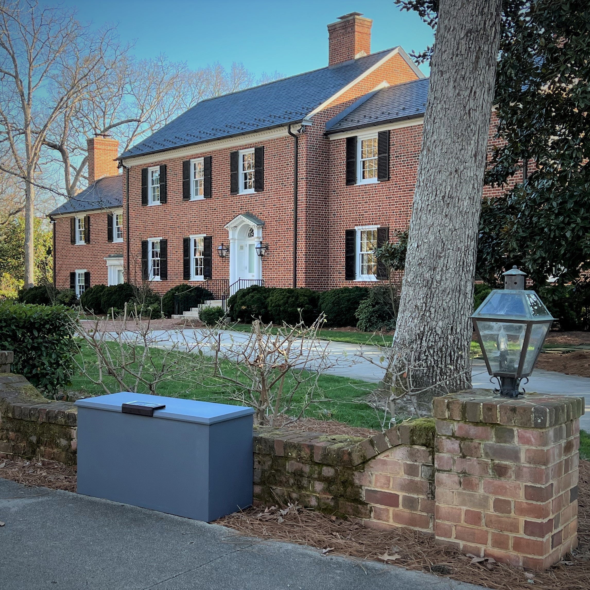 Loxx Boxx using cellular service street side in a luxury neighborhood.